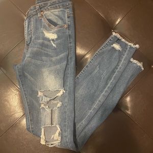 Distressed jeans/ jeggings. Size S. Light wash